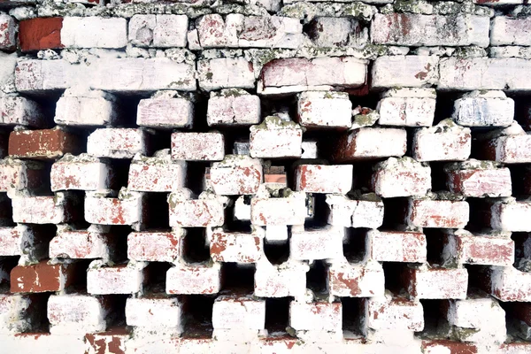 Bricks fell out of an old wall background — Stock Photo, Image