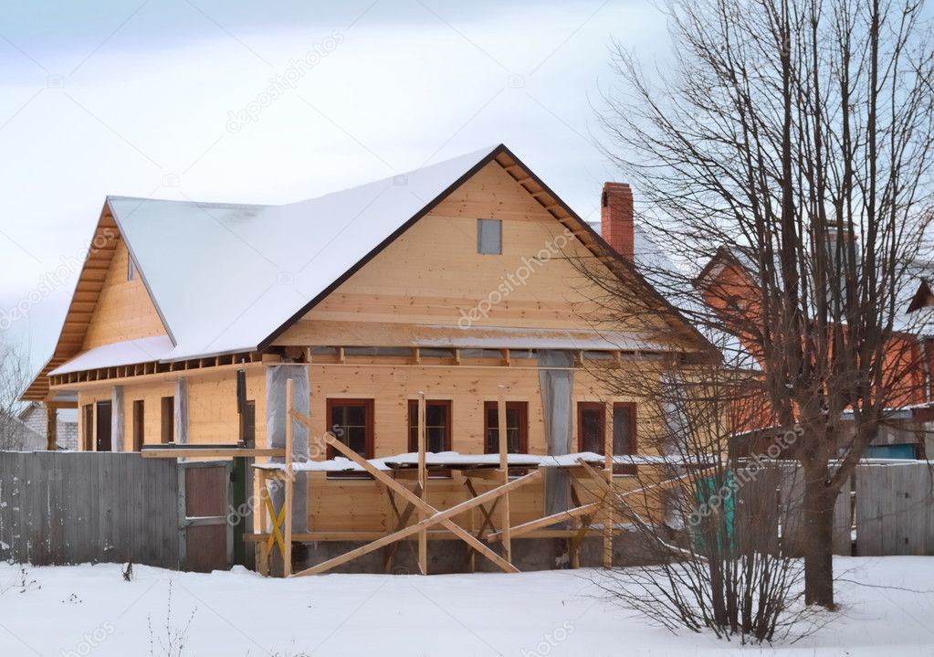 construction of a wooden house in the village