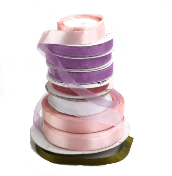 Μπομπίνα με σατέν και κορδέλες από διαφορετικά χρώματα νάιλον — Φωτογραφία Αρχείου