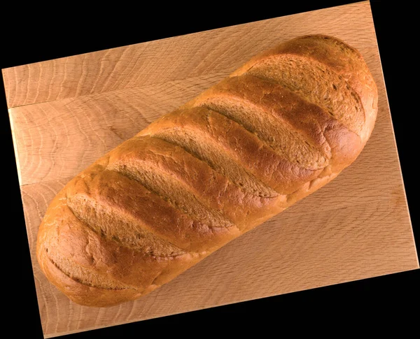 Pane Intero Rubicondo Tavola Legno Fondo Nero — Foto Stock