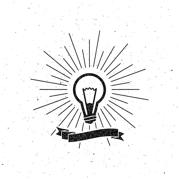 Étiquette ampoule avec ruban et rayons lumineux — Image vectorielle