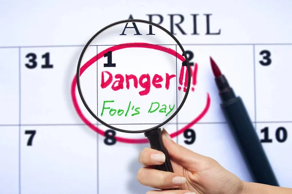 The date of April 1 is circled on the calendar close up. April Fool\'s Day