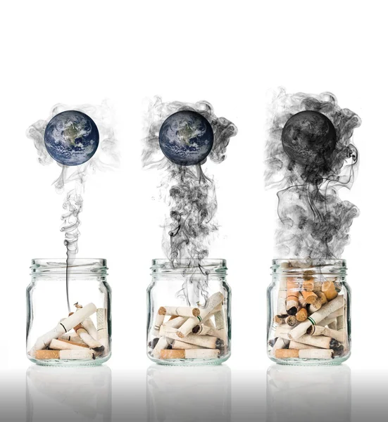 Cigarette butt in bottle with smoke Burning the world, world no tobacco day, Elements of this image furnished by NASA — Stock Photo, Image