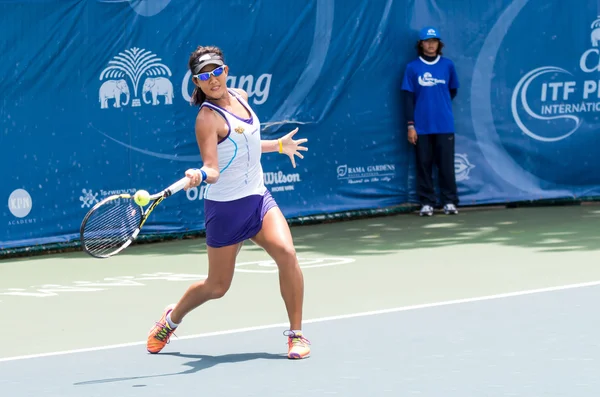 stock image BANGKOK, MAY 22 : Bunyawi Thamchaiwat of Thailand action in Chang ITF Pro Circuit 3 International Tennis Federation 2015 on semi final match at Rama Gardens Hotel on May 22, 2015 in Bangkok Thailand.