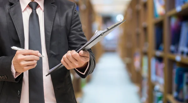 Zakenman bestand Schrijfpaneel — Stockfoto