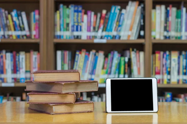 Old books with tablet — Stock Photo, Image