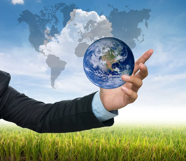 Earth over Businessman hand — Stock Photo, Image