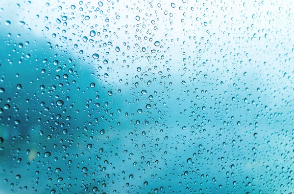 Gocce d'acqua sulla finestra di vetro — Foto Stock