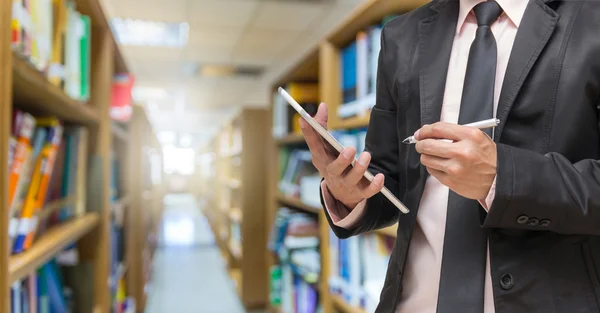 Businessman using tablet — Stock Photo, Image