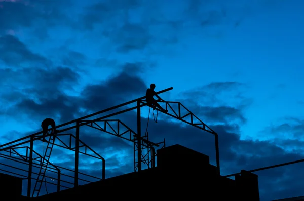 Silhouette of Carpenters working — Stock Photo, Image