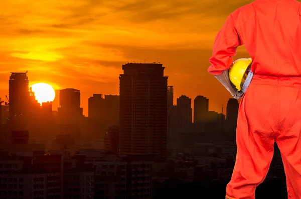 Asian engineer worker holding hardhat — Stock Photo, Image