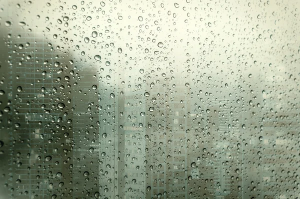 Waterdrops on glass surface window — Stock Photo, Image