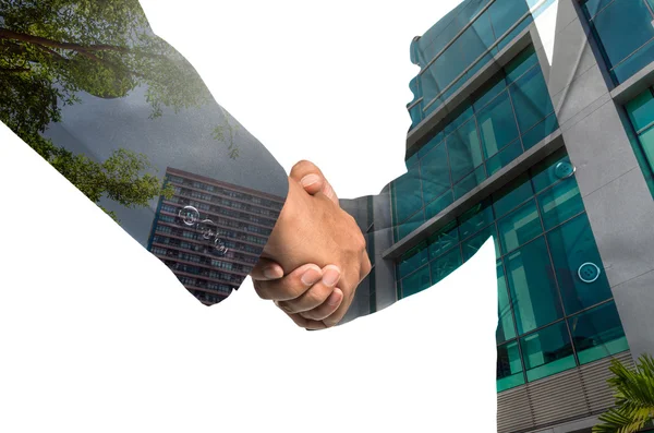 Двойное рукопожатие между бизнесменами — стоковое фото