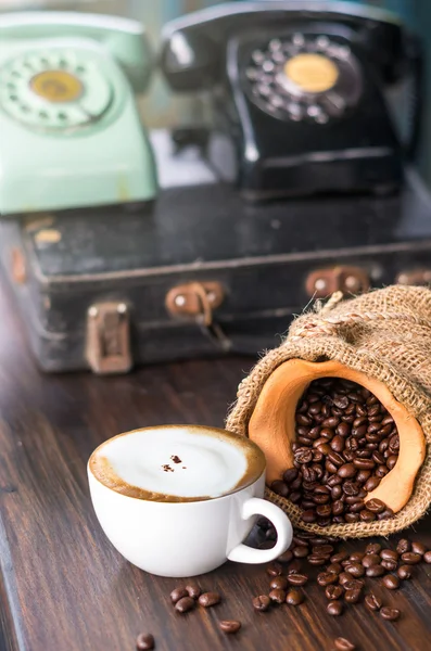 Cappuccino Coffee cup with beans — Stock Photo, Image