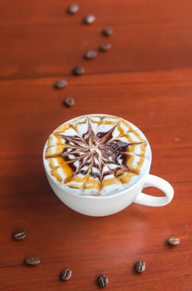 Latte arte xícara de café — Fotografia de Stock