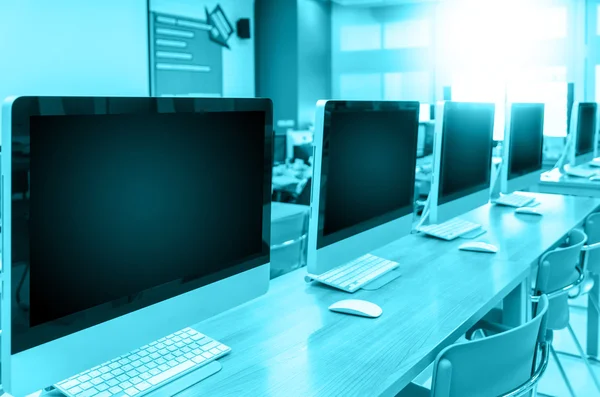 Rows of computers in room — Stock Photo, Image