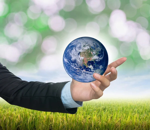 Earth in Businessman hand — Stock Photo, Image