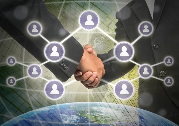Business handshake with Social media symbols — Stock Photo, Image