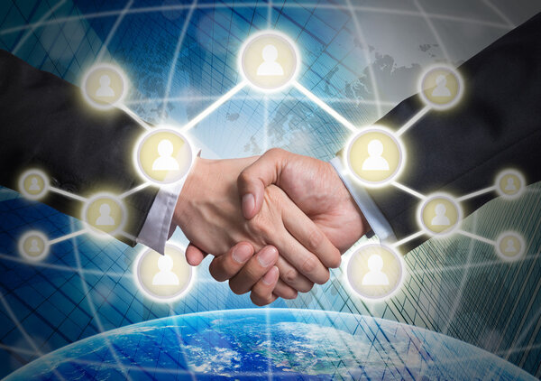 Business handshake with Social media symbols