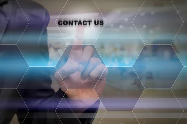 Businessman touching Contact us icon — Stock Photo, Image