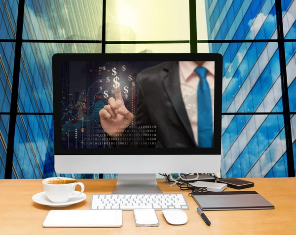 Computer desktop with Businessman point sign — Stock Photo, Image