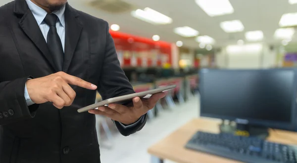 Businessman using tablet