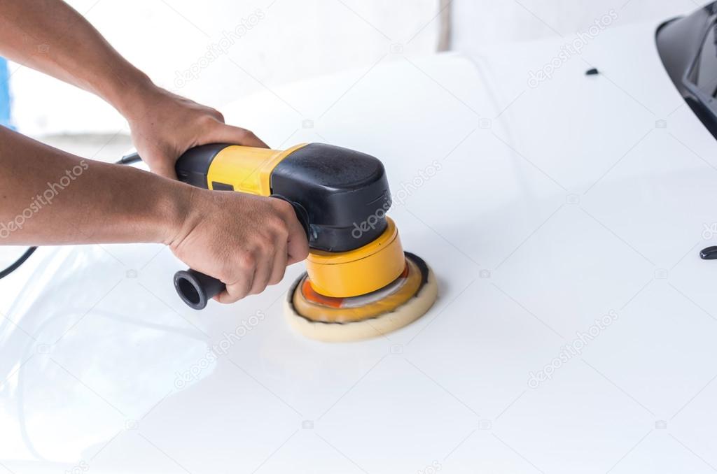 Polishing white car Stock Photo by ©Tzido 124319876