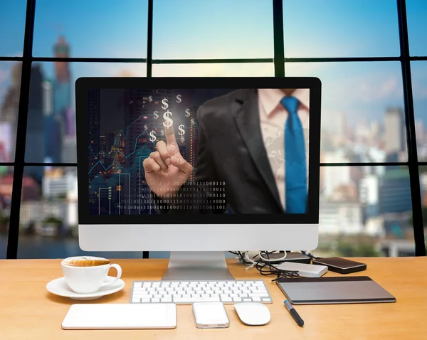 Computer desktop with Businessman point sign — Stock Photo, Image