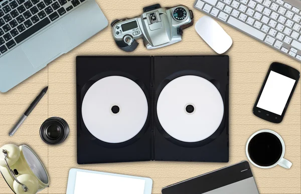 Disks with cover and office accessories — Stock Photo, Image