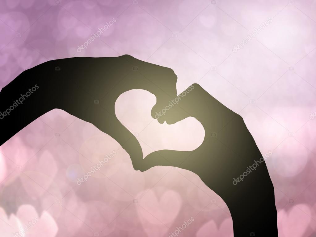 Two hands making heart shape 