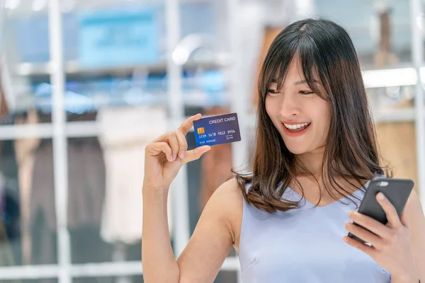 Asian Woman Using Credit Card Mobile Phone Online Shopping Department — Stock Photo, Image