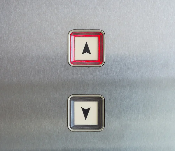 Botão de elevador para cima e para baixo direção com luz vermelha — Fotografia de Stock