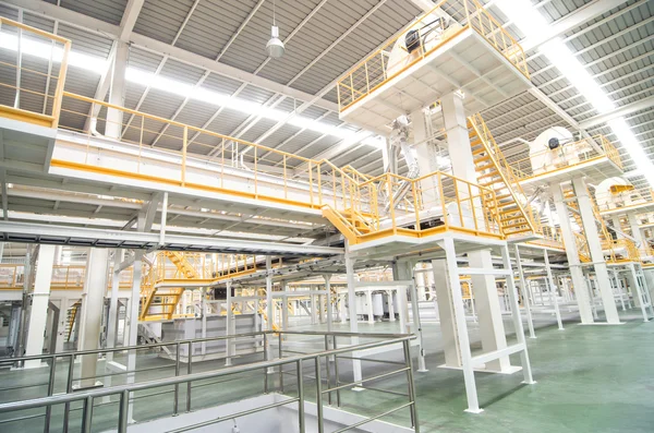 Factory equipment inside Industrial conveyor line transporting