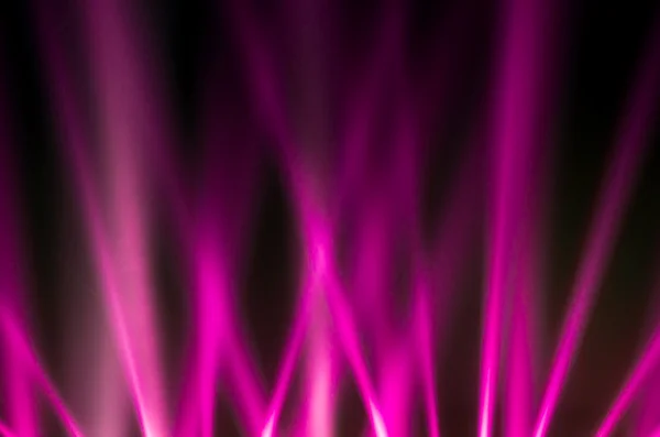 Pink luminous rays on a dark background — Stock Photo, Image