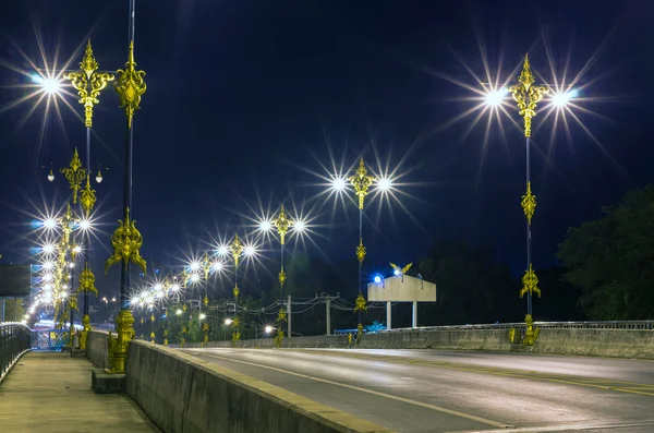 On the bridge at twilight time — Stock Photo, Image