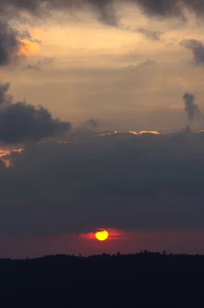 Sunset behide mountain — Stock Photo, Image