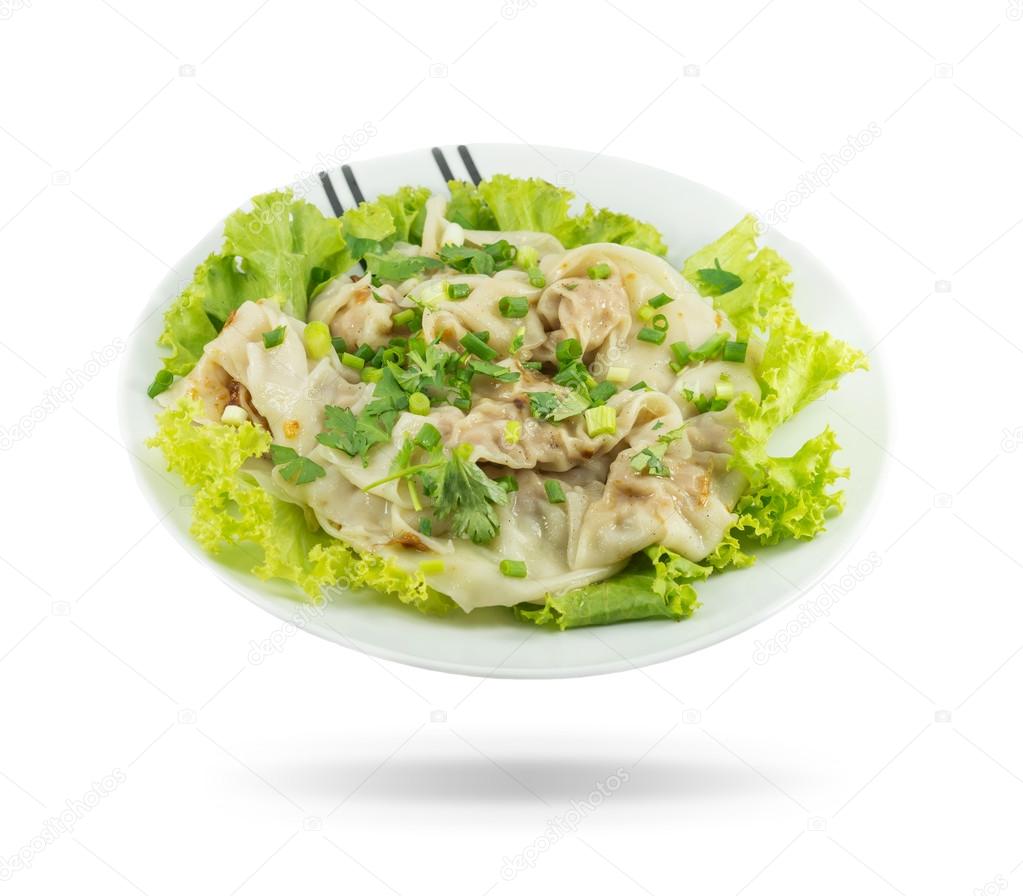 boiled dumpling in plate on white background, chinese food