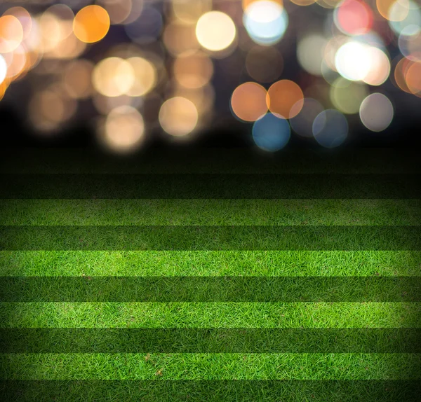 Fotbollsplan med bokeh bakgrund — Stockfoto