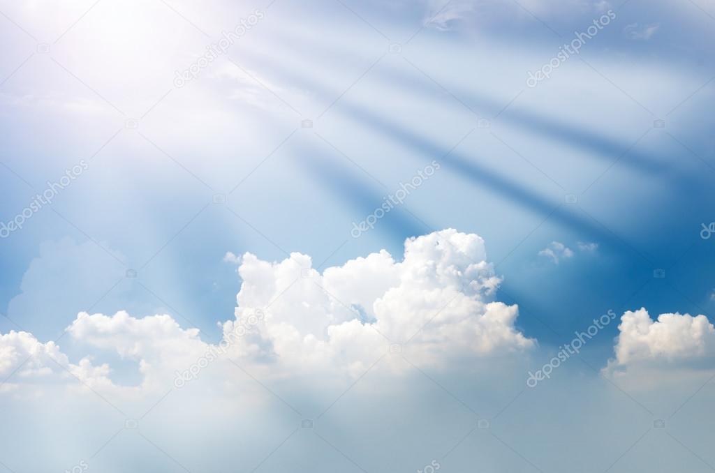 blue sky with cloud and sun ray