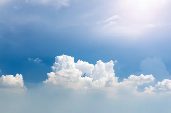 Blue sky with cloud and sun ray — Stock Photo, Image