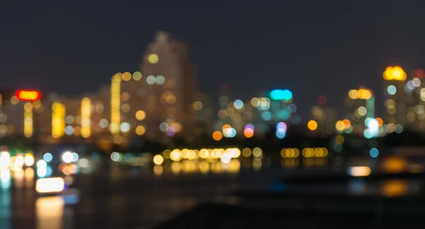 Bangkok paisaje urbano en la hora del crepúsculo, borrosa Foto bokeh —  Fotos de Stock