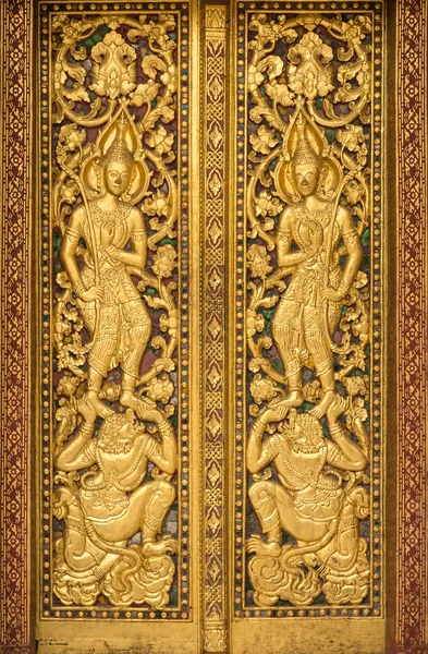Konst på buddhismen tempel dörr — Stockfoto