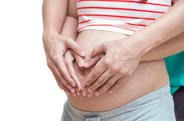 Loving couple hands on pregnant belly — Stock Photo, Image