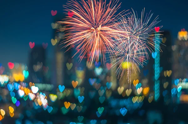 Multicolor fireworks with Heart bokeh background, Love concept — Stock Photo, Image