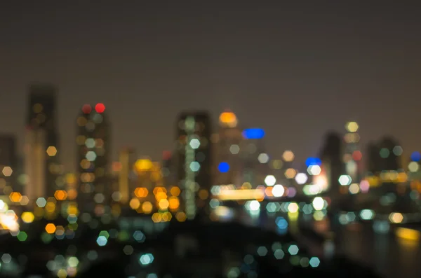 Bangkok vista do rio cityscape no crepúsculo tempo, embaçado foto bok — Fotografia de Stock