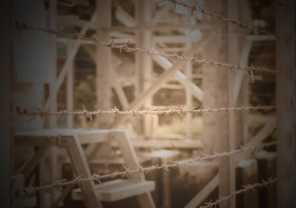 Barbed Wire Fence border the dangerous area — Stock Photo, Image