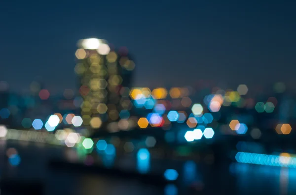 Bangkok vista do rio cityscape no crepúsculo tempo, embaçado foto bok — Fotografia de Stock