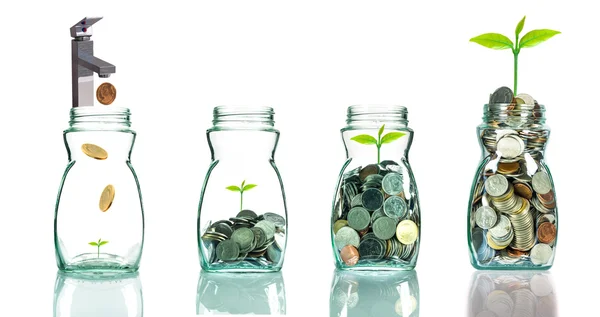 Faucet putting mix coins and seed in clear bottle on white backg — Stock Photo, Image