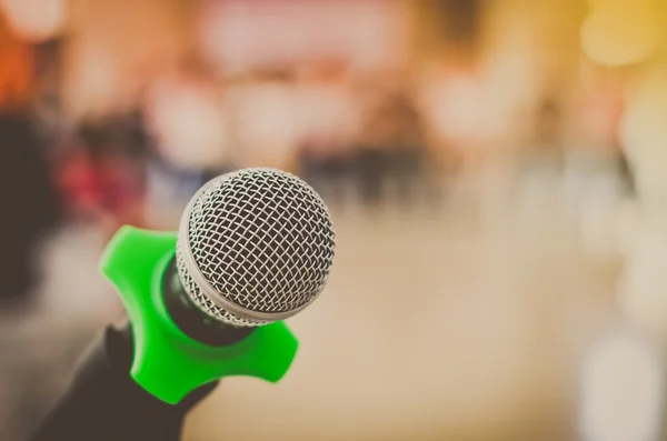 Close up of microphone in conference room on blurred background — Stock Photo, Image