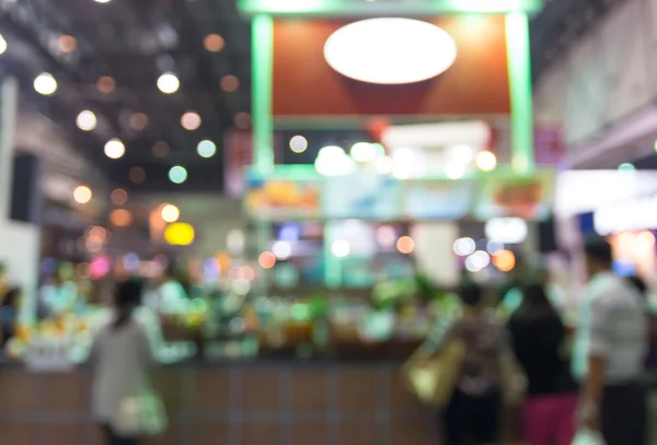 abstract coffee shop store blurred in hall with bokeh background